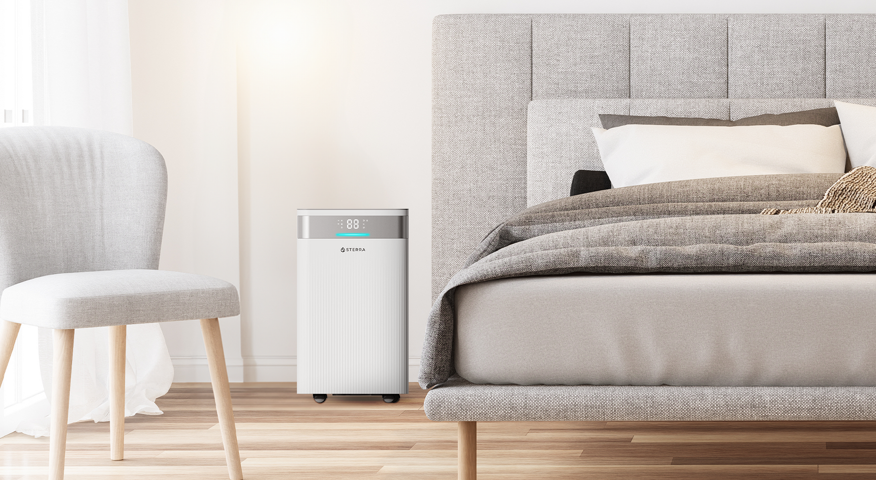 Air purifier in a modern bedroom next to a bed and chair.