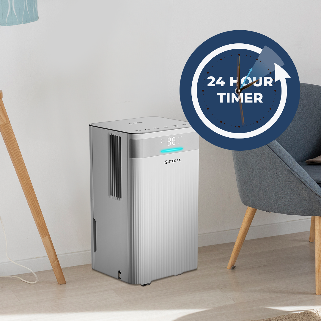 Air purifier with 24-hour timer feature in a modern living room setting.