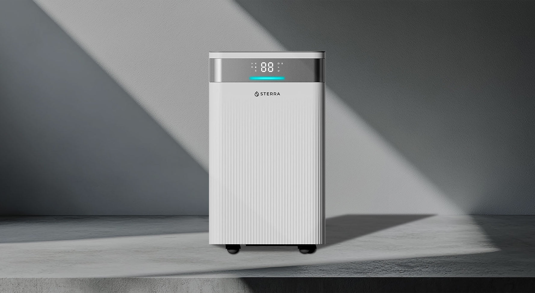 White air purifier with LED display on a minimalist background.