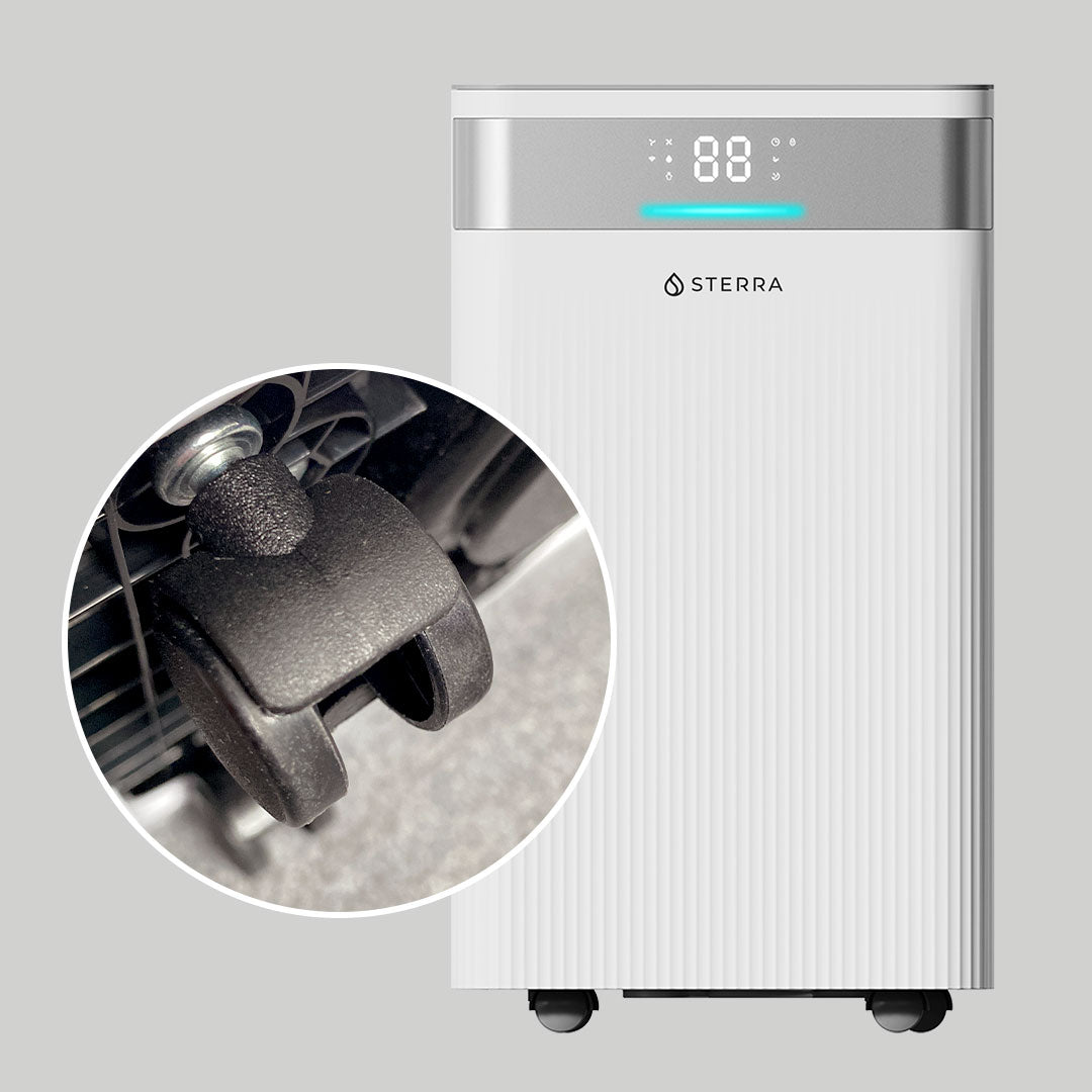 White Sterra air purifier with a close-up of its caster wheel.